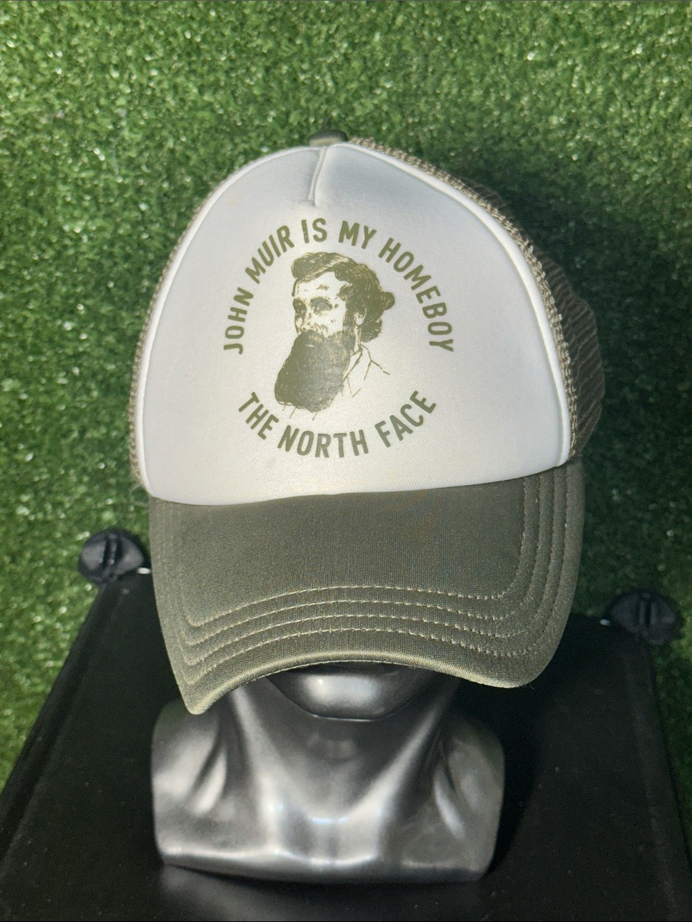 The North Face Olive Green and White Graphic Trucker Hat